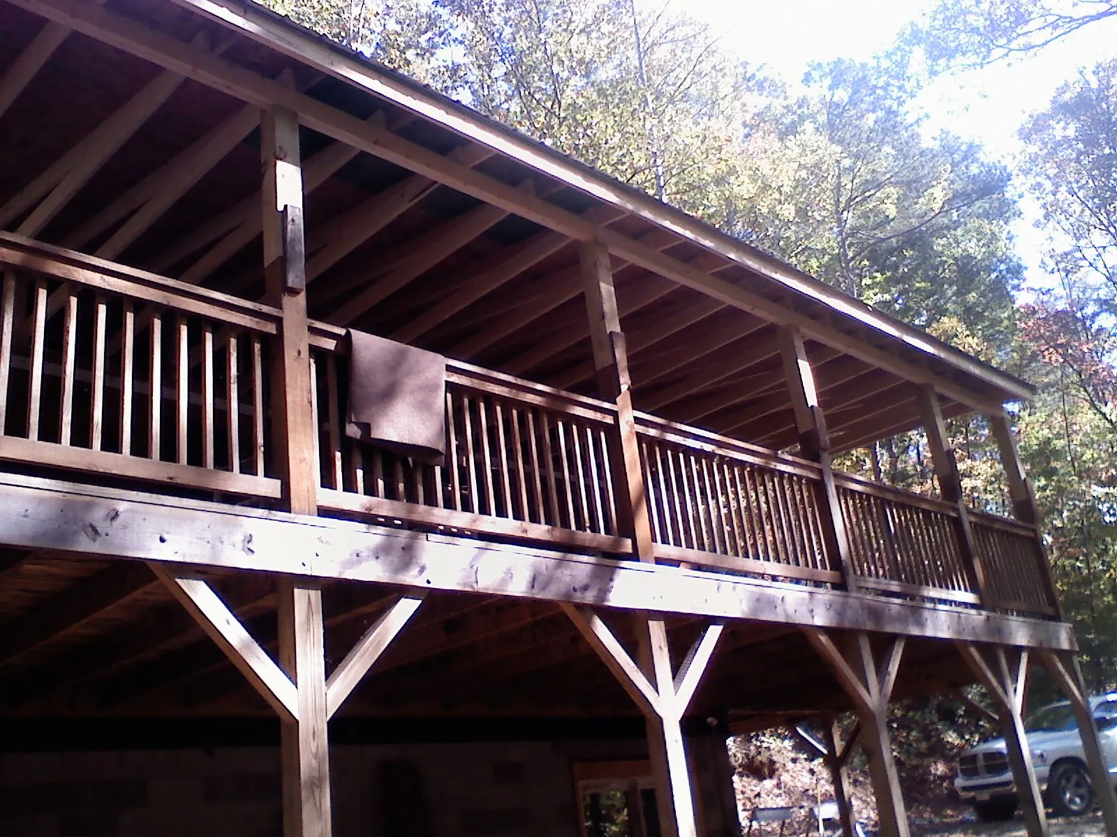 Timber framing under a new elevated porch and deck — Roof Leak Repair in Sodus by Roofing Brothers